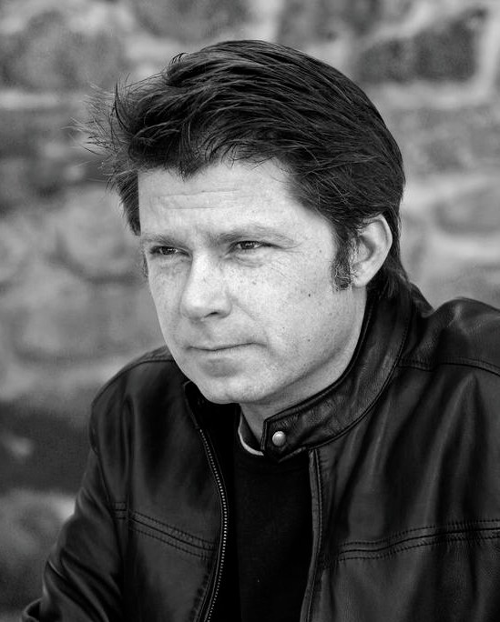 Black-and-white portrait of Anders Krusberg